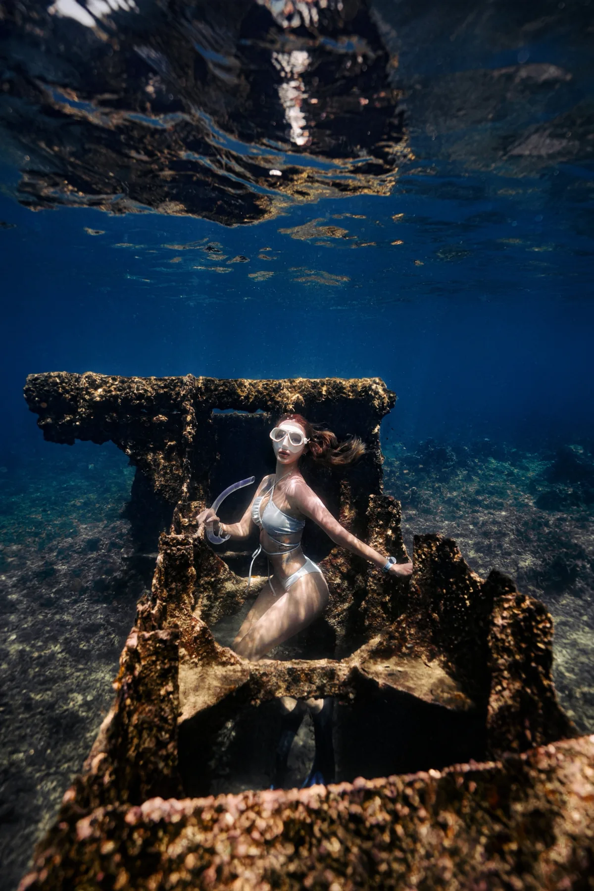 Minseo inside a shallow wreck